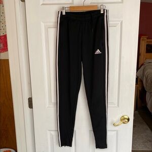 Adidas Black Sweatpants with Iconic Stripes